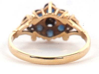 Lot 47 - A 9ct sapphire and diamond ring, with a...