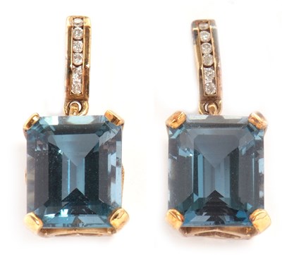 Lot 97 - A pair of 9ct topaz and diamond earrings, the...