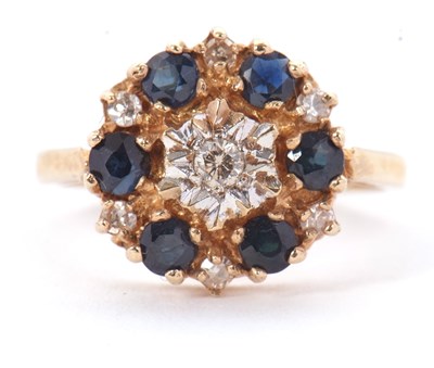 Lot 55 - A 9ct sapphire and diamond ring, the central...