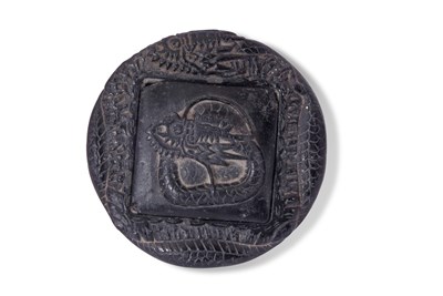 Lot 150 - Chinese circular black slate inkwell and cover...