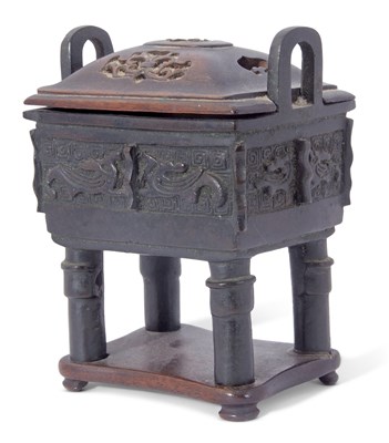 Lot 151 - Chinese bronze censer of archaic form, relief...