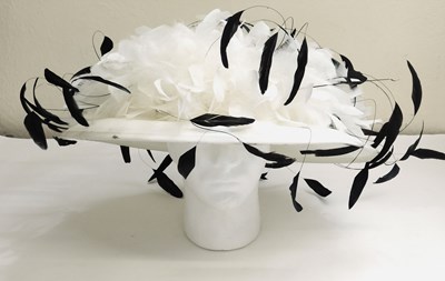 Lot 80 - A black and white feather hat by Right...