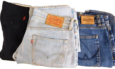 Lot 53 - Three pairs of jeans: to include a pair of...