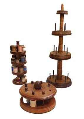 Lot 136 - Three turned wood bobbin stands, tallest 48cm...