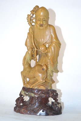 Lot 228 - A carved figure of a Chinese immortal, 30cm high