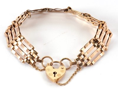 Lot 164 - A 9ct gate bracelet, 13mm wide, with jump ring...