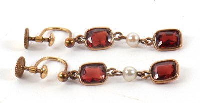 Lot 100 - A pair of garnet and cultured pearl earrings,...