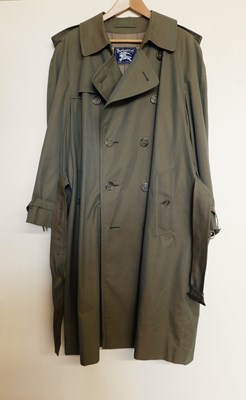 Lot 161 - A gentleman's Burberry's green trenchcoat,...