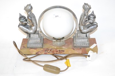 Lot 318 - An Art Deco style lamp with two metal figures...