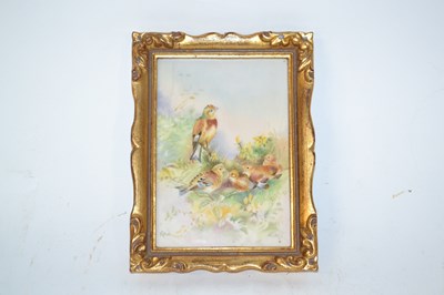 Lot 358 - A small ceramic plaque painted with a girl and...