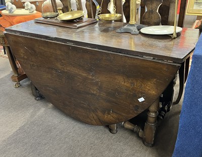Lot 456 - A good quality reproduction oak drop leaf...