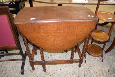 Lot 388 - SMALL OVAL OAK DINING TABLE ON BARLEY TWIST LEGS