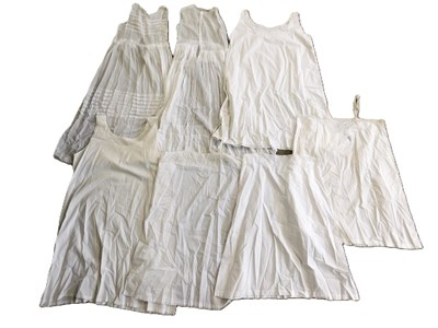 Lot 2 - Seven white and cream cotton chemise, (7)