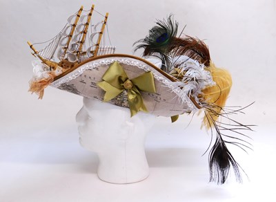 Lot 76 - A steampunk style hat, with map fabric,...