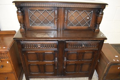 Lot 443 - MID-20TH CENTURY DARK OAK COURT CABINET WITH...
