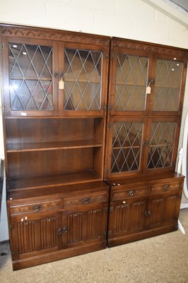 Lot 467 - TWO MODERN OAK LEAD GLAZED LOUNGE BOOKCASE...