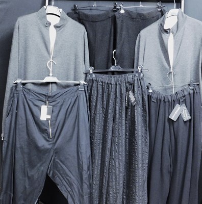 Lot 36 - Two reversible grey and cream zip front...