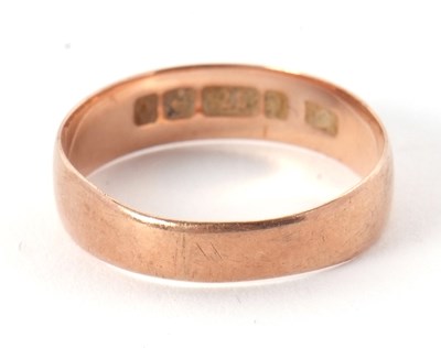 Lot 193 - A 9ct rose gold wedding band, stamped 375 and...