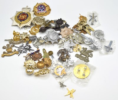 Lot 45 - Quantity of ER II Military cap badges to...