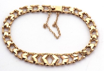Lot 179 - A 9ct gold bracelet, with tapered V-shape...