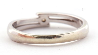 Lot 27 - A 9ct diamond ring, the central round...