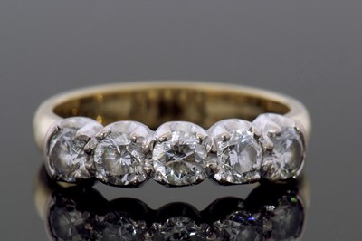 Lot 309 - Five-stone diamond ring featuring five round...