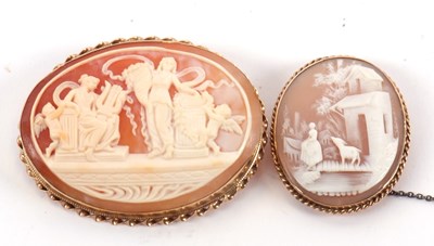 Lot 155 - Two cameo brooches: to include a 9ct oval...