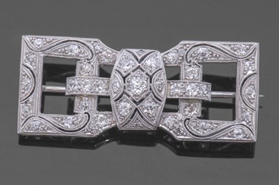 Lot 340 - Art Deco precious metal and diamond brooch of...