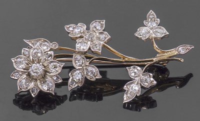 Lot 317 - Precious metal diamond set floral spray brooch,...