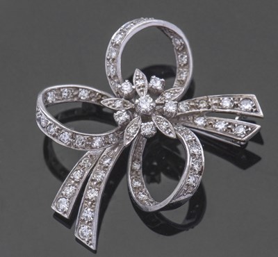 Lot 223 - 18ct white gold and diamond set floral and...