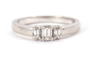 Lot 1 - A platinum and diamond ring, the three...