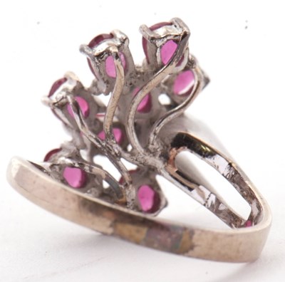 Lot 11 - A ruby and diamond ring, asymetrically set...