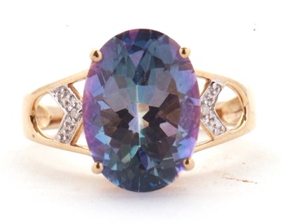 Lot 15 - A 9ct 'mystic' topaz ring, the oval 'mystic'...