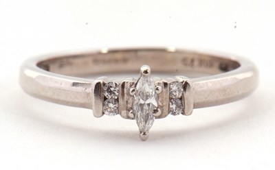 Lot 17 - An 18ct diamond ring, the central marquise...