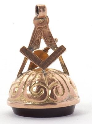 Lot 177 - A Masonic fob, the round fob with Masonic red...
