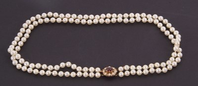 Lot 233 - A cultured pearl and garnet necklace, the two...