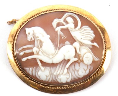 Lot 138 - A cameo brooch, the oval shell cameo with...