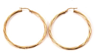 Lot 171 - A pair of 9ct earhoops, the twisted hoops,...