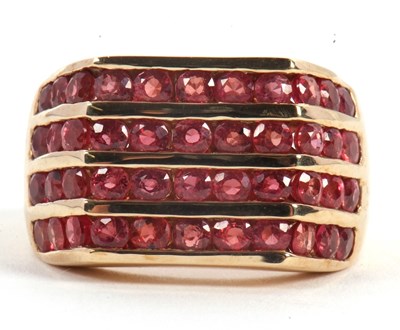 Lot 59 - A 9ct synthetic padparadscha ring, set with...