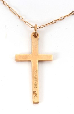 Lot 188 - A 15ct cross and chain, the cross stamped...