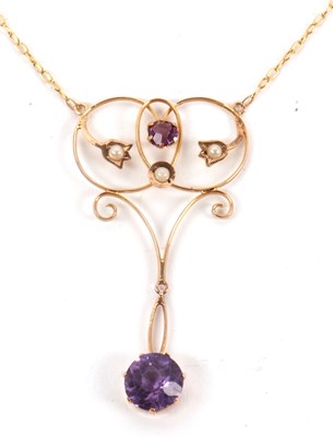 Lot 142 - A Edwardian amethyst and seed pearl pendant...