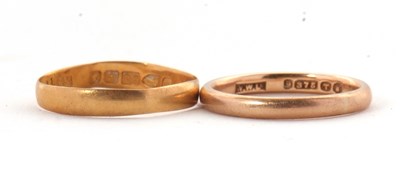 Lot 185 - Two gold rings: to include a 22ct wedding band,...