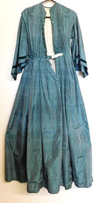 Lot 423 - A mid Victorian dress, in green striped silk...