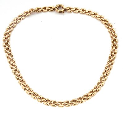 Lot 215 - A 9ct necklace, the three row brick link style...