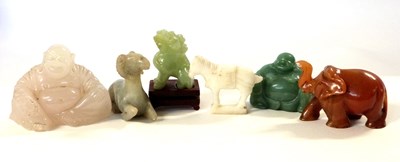 Lot 214 - Group of quartz and jade type figures...