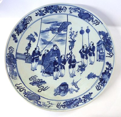 Lot 220 - A large Oriental porcelain charger with a blue...