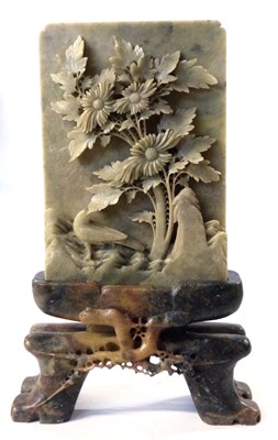 Lot 232 - A carved soapstone rectangular panel carved...