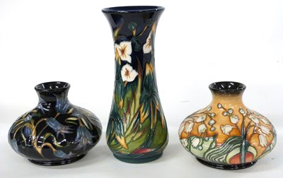 Lot 251 - Group of three Moorcroft vases one with a...