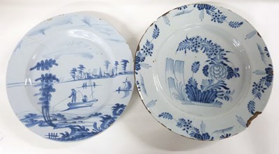 Lot 262 - Two 18th Century English Delft charges, 35cm...