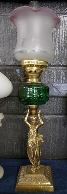 Lot 287 - A further 19th Century oil lamp with green...